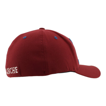 Burgundy cap with a skull  wearing hockey helmet and crossbones design on a white background