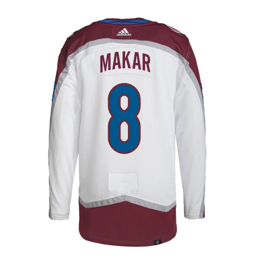 Colorado Avalanche Cale Makar #8 white and burgundy Adidas hockey jersey shown from the back
