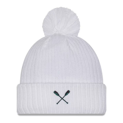 White beanie with a pom-pom and embroidered design on a white background