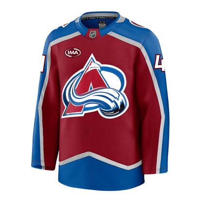 Front view of a home Colorado Avalanche hockey jersey in burgundy and blue with  silver accents, featuring the primary A-logo on the front, an burgundy and white IMA sponsorship patch on the chest, and the number 41 on the sleeves.